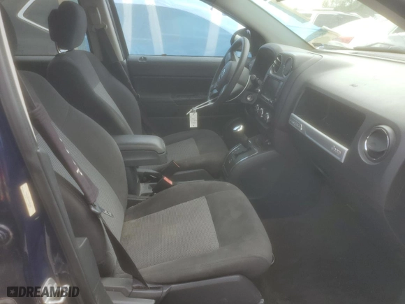 2016 Jeep Compass Sport with VIN 1C4NJCBA1GD785092, listed as a Copart auction lot 50059665 with 142,434 mi miles and Salvage Title. Bid and sale history available at carsss.com. Image 7.
