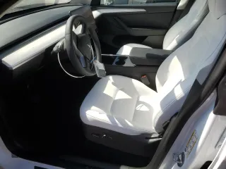 2023 Tesla Model Y Long Range with VIN 7SAYGDEE5PF691745, listed as a Copart auction lot 47784545 with 21,117 mi miles and Salvage Title. Bid and sale history available at DreamBid. Image 7.
