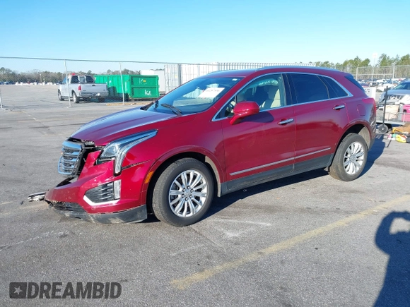 2018 Cadillac XT5 FWD with VIN 1GYKNARS4JZ211455, listed as a IAAI auction lot 41257536 with 102,032 mi miles and . Bid and sale history available at DreamBid. Image 16.