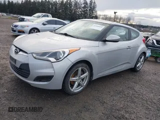 2012 Hyundai Veloster w/Gray Int with VIN KMHTC6AD8CU063977, listed as a IAAI auction lot 41494419 with 192,179 mi miles and . Bid and sale history available at DreamBid. Image 2.