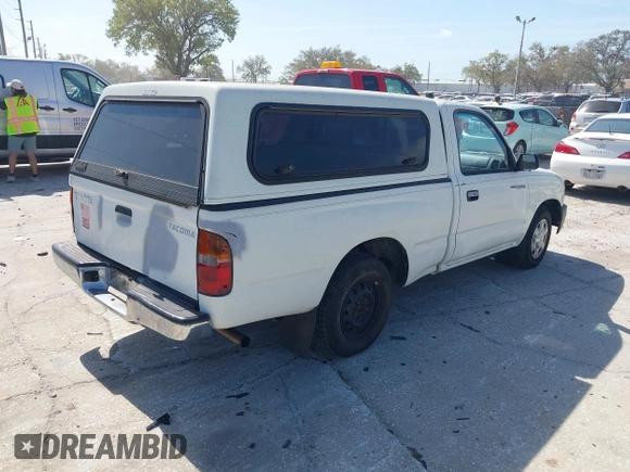 1998 Toyota Tacoma with VIN 4TANL42N2WZ022014, listed as a IAAI auction lot 41721566 with 175,566 mi miles. Bid and sale history available at carsss.com. Image 4.