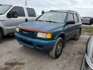 1999 Isuzu Rodeo S with VIN 4S2CK58W9X4322074, listed as a Copart auction lot 76999244 with 110,142 mi miles and Salvage Title. Bid and sale history available at carsss.com. Image 1.