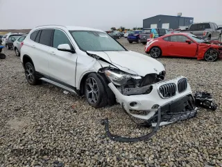 2019 BMW X1 sDrive28i with VIN WBXHU7C53K5L12037, listed as a Copart auction lot 65538082 with Not Provided miles. Bid and sale history available at carsss.com. Image 1.