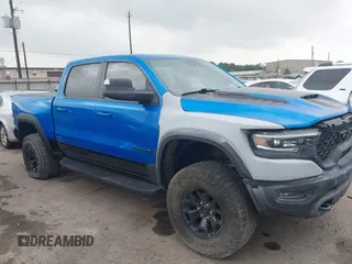 2021 Ram 1500 TRX with VIN 1C6SRFU91MN790158, listed as a IAAI auction lot 42115253 with 30,969 mi miles and . Bid and sale history available at DreamBid. Image 1.