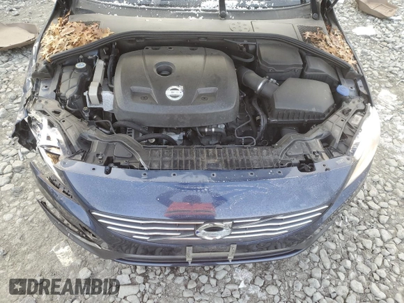 2015 Volvo S60 T5 Drive-E Premier z VIN YV126MFB2F2304526, wystawiony jako Copart lot #86641134 z przebiegiem 79 551 mil mil oraz Szkoda całkowita • Salvage title. Historia ofert i sprzedaży dostępna na DreamBid. Obrazek 13.