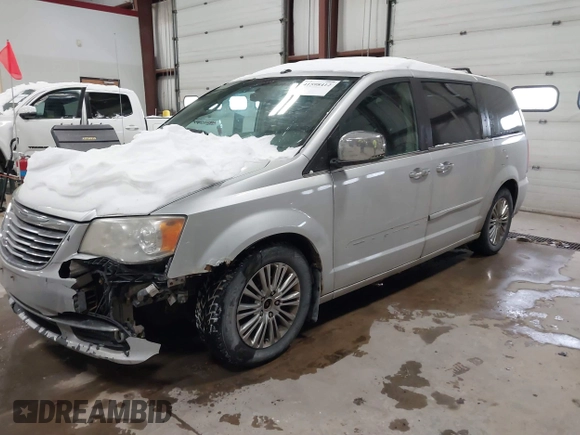 2011 Chrysler Town & Country Limited with VIN 2A4RR6DG3BR698226, listed as a IAAI auction lot 41598412 with 184,998 mi miles. Bid and sale history available at carsss.com. Image 22.