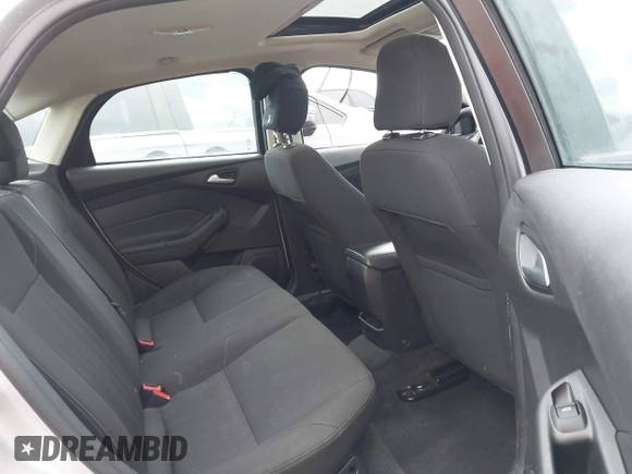 2015 Ford Focus SE with VIN 1FADP3F26FL254588, listed as a IAAI auction lot 42146381 with 99,280 mi miles and . Bid and sale history available at DreamBid. Image 8.
