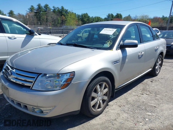2008 Ford Taurus SEL with VIN 1FAHP24W18G115823, listed as a IAAI auction lot 42119435 with 57,867 mi miles. Bid and sale history available at carsss.com. Image 2.