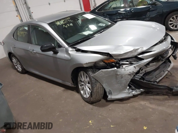 2019 Toyota Camry LE z VIN 4T1B11HK5KU814007, wystawiony jako IAAI lot #42099677 z przebiegiem 91 779 mil mil oraz . Historia ofert i sprzedaży dostępna na DreamBid. Obrazek 1.