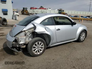 2013 Volkswagen Beetle Entry with VIN 3VWFP7AT9DM668662, listed as a Copart auction lot 59035405 with 114,853 mi miles and Salvage title. Bid and sale history available at DreamBid. Image 3.