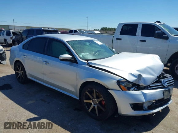 2015 Volkswagen Passat 1.8T Limited Edition with VIN 1VWAT7A30FC014689, listed as a IAAI auction lot 41758748 with 140,545 mi miles. Bid and sale history available at carsss.com. Image 1.