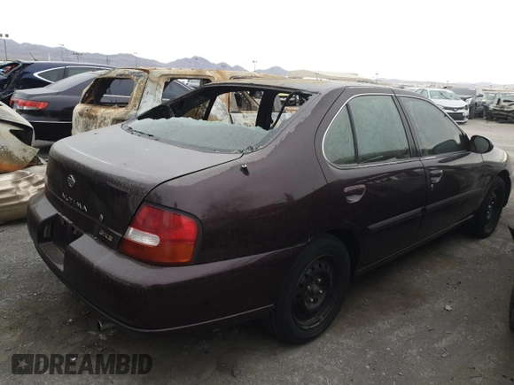 1998 Nissan Altima XE with VIN 1N4DL01D8WC266874, listed as a Copart auction lot 48636595 with 0 mi miles and Salvage Title. Bid and sale history available at carsss.com. Image 3.