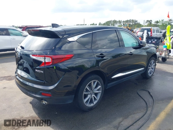 2020 Acura RDX w/Technology Pkg with VIN 5J8TC1H57LL002097, listed as a IAAI auction lot 41957752 with 60,945 mi miles. Bid and sale history available at carsss.com. Image 4.