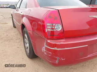 2010 Chrysler 300 Touring with VIN 2C3CA5CV3AH138812, listed as a IAAI auction lot 41870285 with 165,788 mi miles. Bid and sale history available at carsss.com. Image 6.