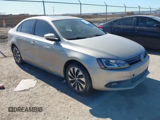 2013 Volkswagen Jetta Hybrid SEL with VIN 3VW637AJ7DM279917, listed as a IAAI auction lot 41400409 with 123,310 mi miles and . Bid and sale history available at DreamBid. Image 1.