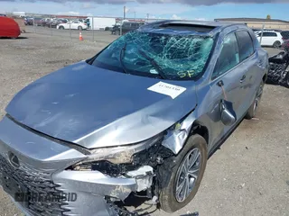 2024 Lexus RX 350 z VIN 2T2BAMBA0RC049779, wystawiony jako IAAI lot #41701330 z przebiegiem 2 560 mil mil oraz . Historia ofert i sprzedaży dostępna na DreamBid. Obrazek 6.