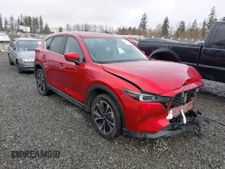 2023 Mazda CX-5 2.5 S Premium Package with VIN JM3KFBDM1P0161605, listed as a IAAI auction lot 41626777 with 26,581 mi miles. Bid and sale history available at carsss.com. Image 1.