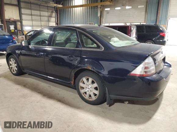 2009 Ford Taurus SE with VIN 1FAHP23W49G123398, listed as a Copart auction lot 81669184 with 145,705 mi miles and Salvage Title. Bid and sale history available at carsss.com. Image 2.