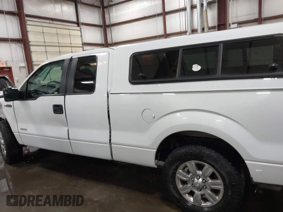 2011 Ford F-150 XL with VIN 1FTFX1CT4BFB57922, listed as a IAAI auction lot 42040372 with 99,027 mi miles and . Bid and sale history available at DreamBid. Image 14.