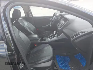 2013 Ford Focus SE z VIN 1FADP3F2XDL354156, wystawiony jako IAAI lot #42231744 z przebiegiem 123 518 mil mil oraz . Historia ofert i sprzedaży dostępna na DreamBid. Obrazek 5.