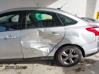 2014 Ford Focus SE with VIN 1FADP3F28EL433519, listed as a IAAI auction lot 41969007 with 137,064 mi miles. Bid and sale history available at carsss.com. Image 6.