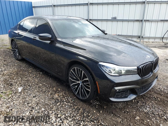 2019 BMW 7 Series 740i with VIN WBA7E2C57KB217455, listed as a Copart auction lot 69580773 with 74,717 mi miles and . Bid and sale history available at DreamBid. Image 4.