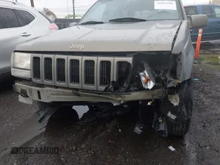 1998 Jeep Grand Cherokee Limited with VIN 1J4GZ78YXWC236969, listed as a IAAI auction lot 41095686 with 182,001 mi miles. Bid and sale history available at carsss.com. Image 6.