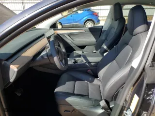 2025 Tesla Model Y Long Range with VIN 7SAYGDEE7SA345301, listed as a Copart auction lot 46693835 with 1,733 mi miles and Salvage Title. Bid and sale history available at carsss.com. Image 7.