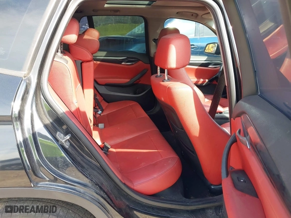 2014 BMW X1 sDrive28i with VIN WBAVM1C51EVW51040, listed as a IAAI auction lot 41956856 with 1 mi miles. Bid and sale history available at carsss.com. Image 8.