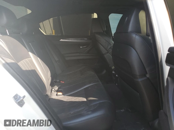 2014 BMW M5 with VIN WBSFV9C54ED097462, listed as a Copart auction lot 70482504 with 76,501 mi miles and Clean Title. Bid and sale history available at carsss.com. Image 10.