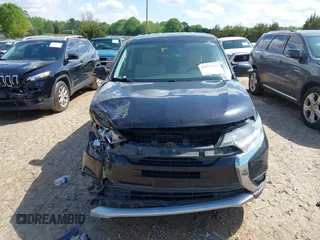 2016 Mitsubishi Outlander SE with VIN JA4AD3A34GZ004085, listed as a IAAI auction lot 41973344 with 122,849 mi miles and . Bid and sale history available at DreamBid. Image 12.