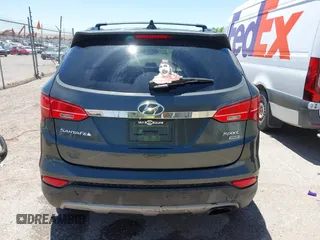 2014 Hyundai Santa Fe with VIN 5XYZUDLB9EG169614, listed as a IAAI auction lot 42208166 with 139,103 mi miles and . Bid and sale history available at DreamBid. Image 16.