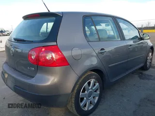 2007 Volkswagen Rabbit with VIN WVWDS71K67W205723, listed as a IAAI auction lot 41637560 with 156,127 mi miles. Bid and sale history available at carsss.com. Image 4.