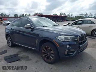 2015 BMW X6 xDrive35i with VIN 5UXKU2C59F0N76242, listed as a IAAI auction lot 41714644 with 170,851 mi miles. Bid and sale history available at carsss.com. Image 1.