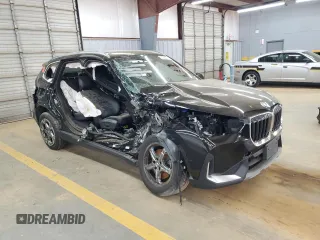 2023 BMW X1 xDrive28i with VIN WBX73EF07P5W50437, listed as a Copart auction lot 51064775 with 0 mi miles and Salvage Title. Bid and sale history available at carsss.com. Image 4.