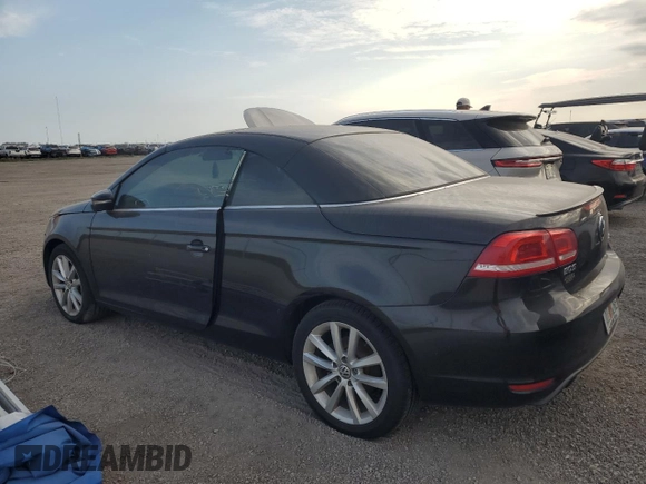 2015 Volkswagen Eos Komfort with VIN WVWBW8AH8FV002052, listed as a Copart auction lot 76487114 with Not Provided miles and Salvage Title. Bid and sale history available at DreamBid. Image 2.