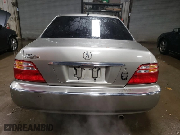 2002 Acura RL z VIN JH4KA96502C012064, wystawiony jako Copart lot #88080895 z przebiegiem 107 477 mil mil oraz Szkoda całkowita • Salvage title. Historia ofert i sprzedaży dostępna na DreamBid. Obrazek 6.
