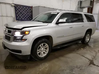 2017 Chevrolet Suburban LT with VIN 1GNSKHKCXHR287693, listed as a Copart auction lot 61864845 with 204,259 mi miles and Salvage title. Bid and sale history available at DreamBid. Image 1.