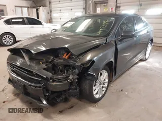 2020 Ford Fusion SE z VIN 3FA6P0LU4LR118809, wystawiony jako IAAI lot #41952995 z przebiegiem 35 353 mil mil oraz . Historia ofert i sprzedaży dostępna na DreamBid. Obrazek 6.
