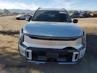 2024 Kia EV9 GT-Line with VIN KNDAEFS53R6021047, listed as a Copart auction lot 84347894 with 7,215 mi miles and Salvage Title. Bid and sale history available at carsss.com. Image 5.