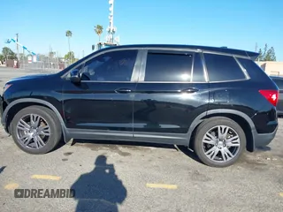 2021 Honda Passport EX-L with VIN 5FNYF7H56MB012736, listed as a IAAI auction lot 41820979 with 47,663 mi miles. Bid and sale history available at carsss.com. Image 14.