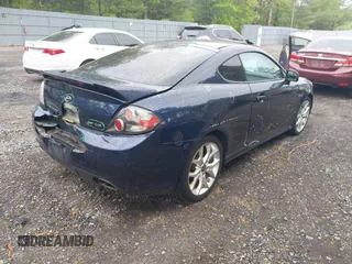 2008 Hyundai Tiburon GT z VIN KMHHN66F98U281833, wystawiony jako IAAI lot #42242717 z przebiegiem 123 291 mil mil oraz . Historia ofert i sprzedaży dostępna na DreamBid. Obrazek 4.