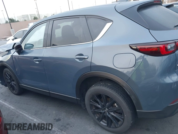 2024 Mazda CX-5 S Carbon Edition z VIN JM3KFBCM6R0359097, wystawiony jako IAAI lot #41743569 z przebiegiem 13 114 mil mil oraz . Historia ofert i sprzedaży dostępna na DreamBid. Obrazek 15.