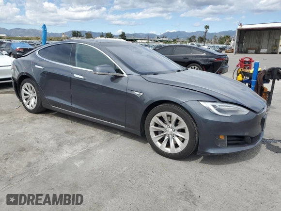 2016 Tesla Model S 70 with VIN 5YJSA1E1XGF149430, listed as a Copart auction lot 51339015 with 104,917 mi miles and Salvage title. Bid and sale history available at DreamBid. Image 4.