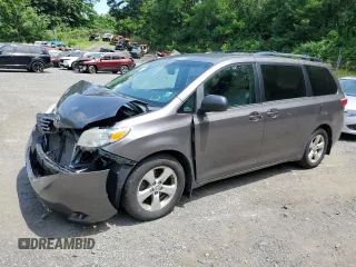2015 Toyota Sienna LE AAS with VIN 5TDKK3DC1FS530427, listed as a Copart auction lot 63308515 with 180,325 mi miles and Salvage title. Bid and sale history available at DreamBid. Image 1.