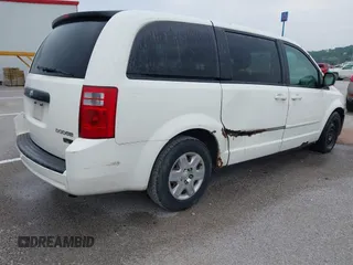 2009 Dodge Grand Caravan SE with VIN 1D8HN44E49B511845, listed as a IAAI auction lot 42490697 with 379,412 mi miles and . Bid and sale history available at DreamBid. Image 4.