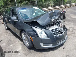 2013 Cadillac XTS Luxury z VIN 2G61P5S34D9109189, wystawiony jako IAAI lot #42242533 z przebiegiem 178 234 mil mil oraz . Historia ofert i sprzedaży dostępna na DreamBid. Obrazek 1.