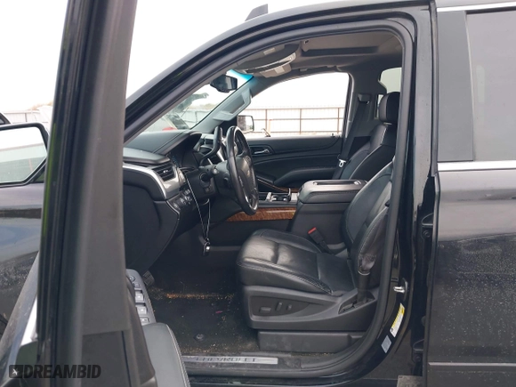 2016 Chevrolet Tahoe LTZ with VIN 1GNSKCKC9GR217166, listed as a IAAI auction lot 41152096 with 133,589 mi miles. Bid and sale history available at carsss.com. Image 5.