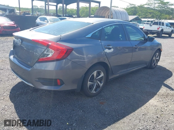 2020 Honda Civic LX z VIN 19XFC2F67LE001375, wystawiony jako IAAI lot #42033879 z przebiegiem 79 941 mil mil oraz . Historia ofert i sprzedaży dostępna na DreamBid. Obrazek 4.