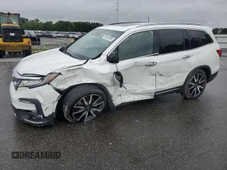 2021 Honda Pilot Touring 7-Passenger with VIN 5FNYF6H68MB035647, listed as a Copart auction lot 56702385 with 77,395 mi miles and Salvage title. Bid and sale history available at DreamBid. Image 1.